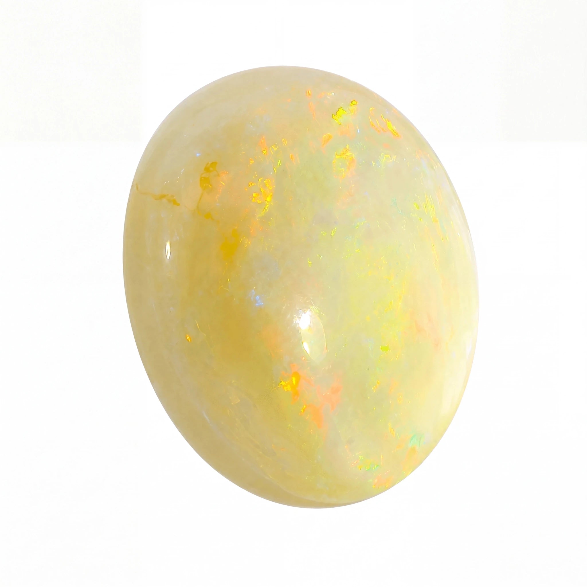 A polished oval cabochon gemstone with a creamy off-white base and vibrant flashes of yellow, orange, and light blue, set against a plain white background.