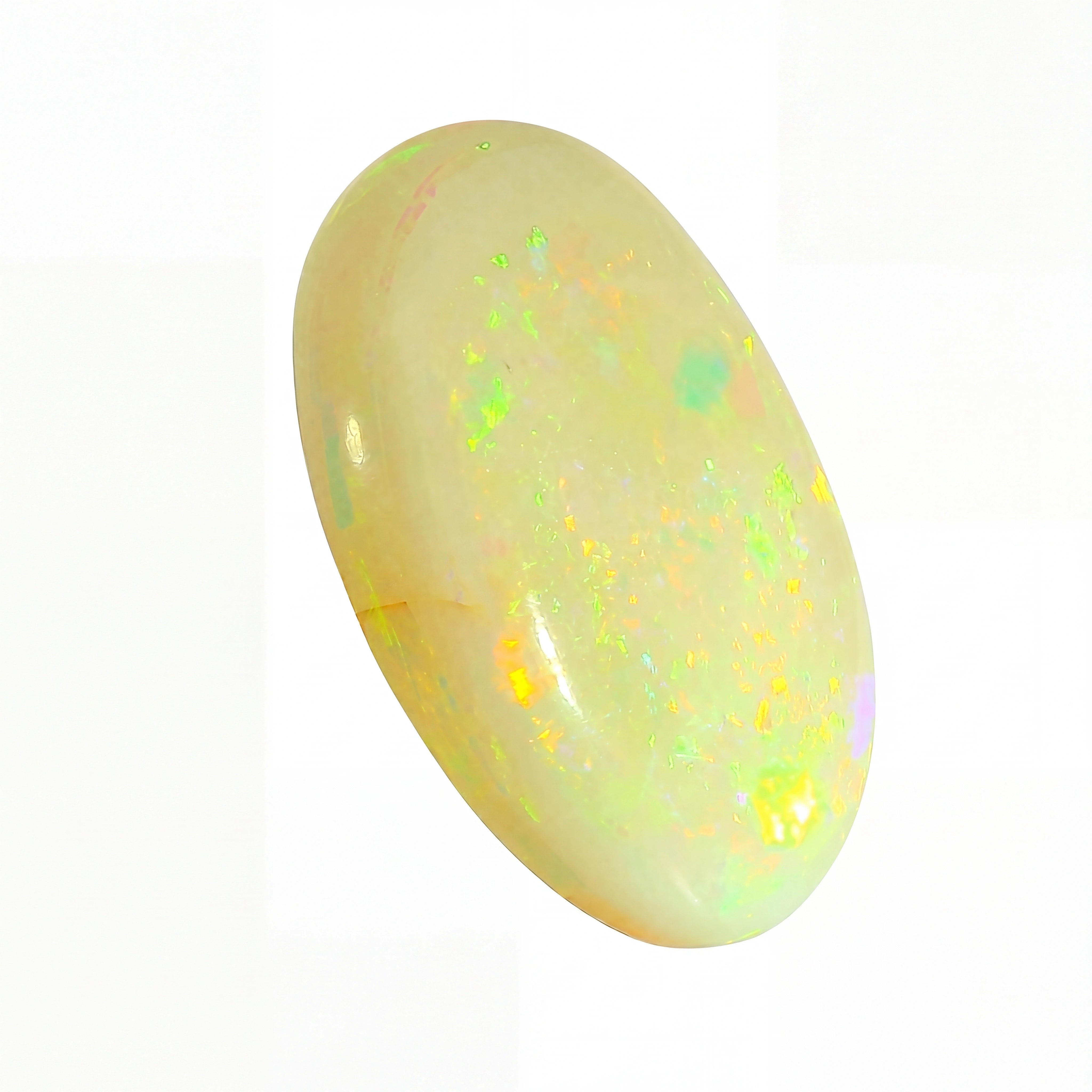 Opal stone with multicoloured speckles on a white background