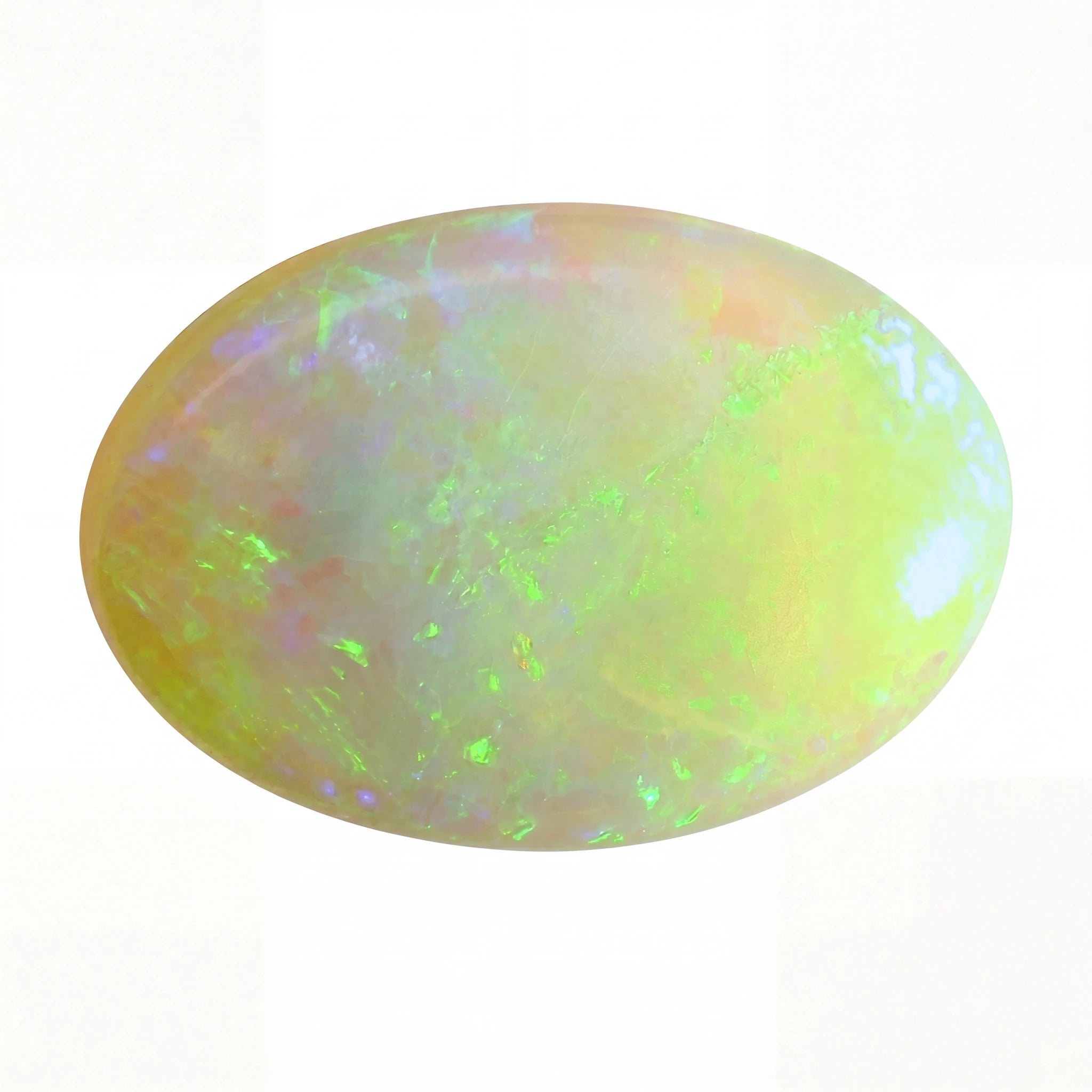 A polished oval cabochon opal gemstone displaying vibrant iridescent flashes of green, yellow, orange, and purple on a white background.
