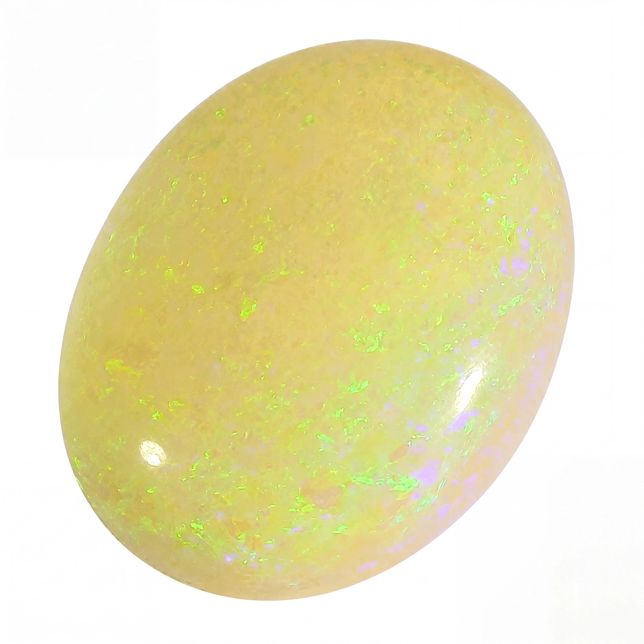 Opal stone with green specks on a white background