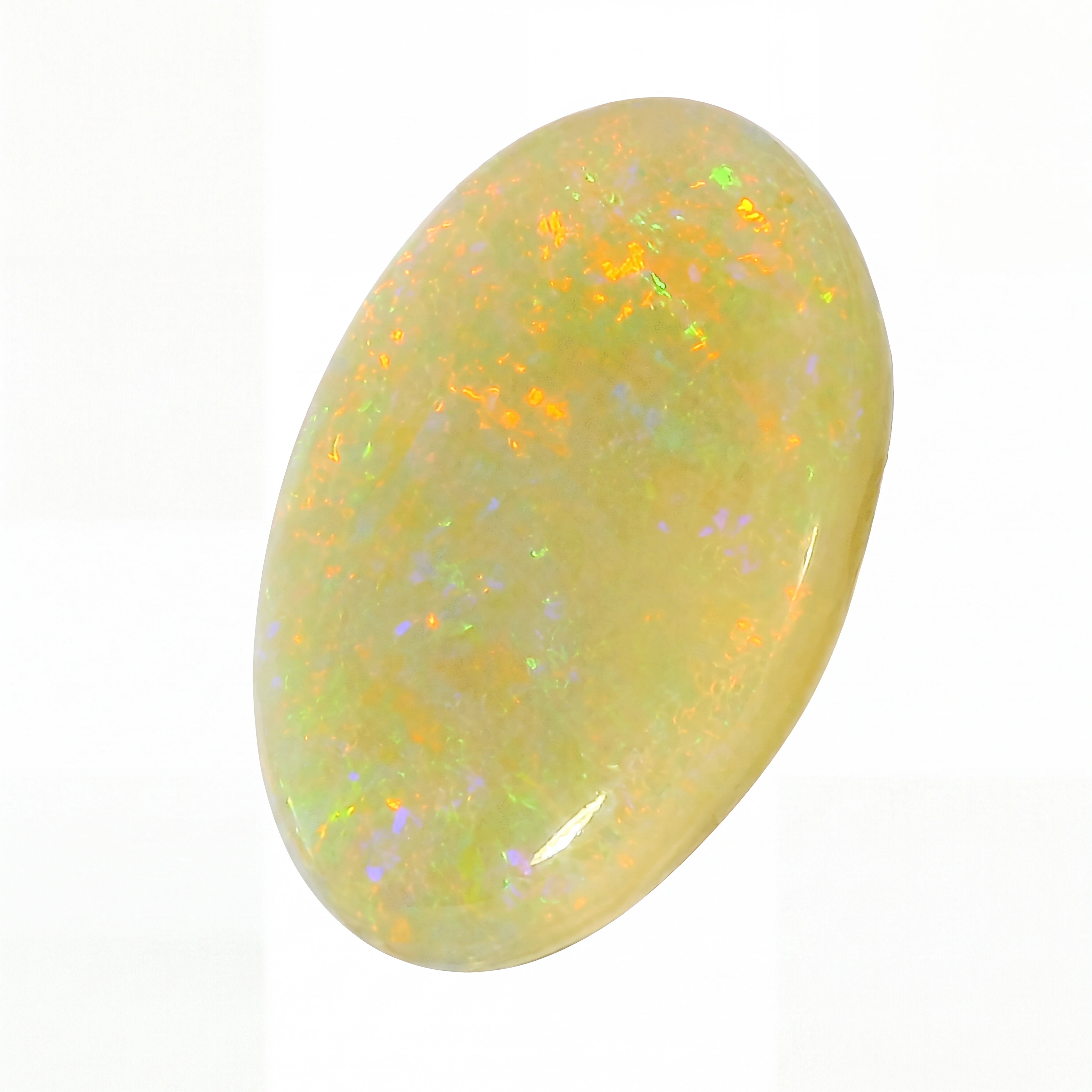 Opal stone with multicoloured play of light on a white background