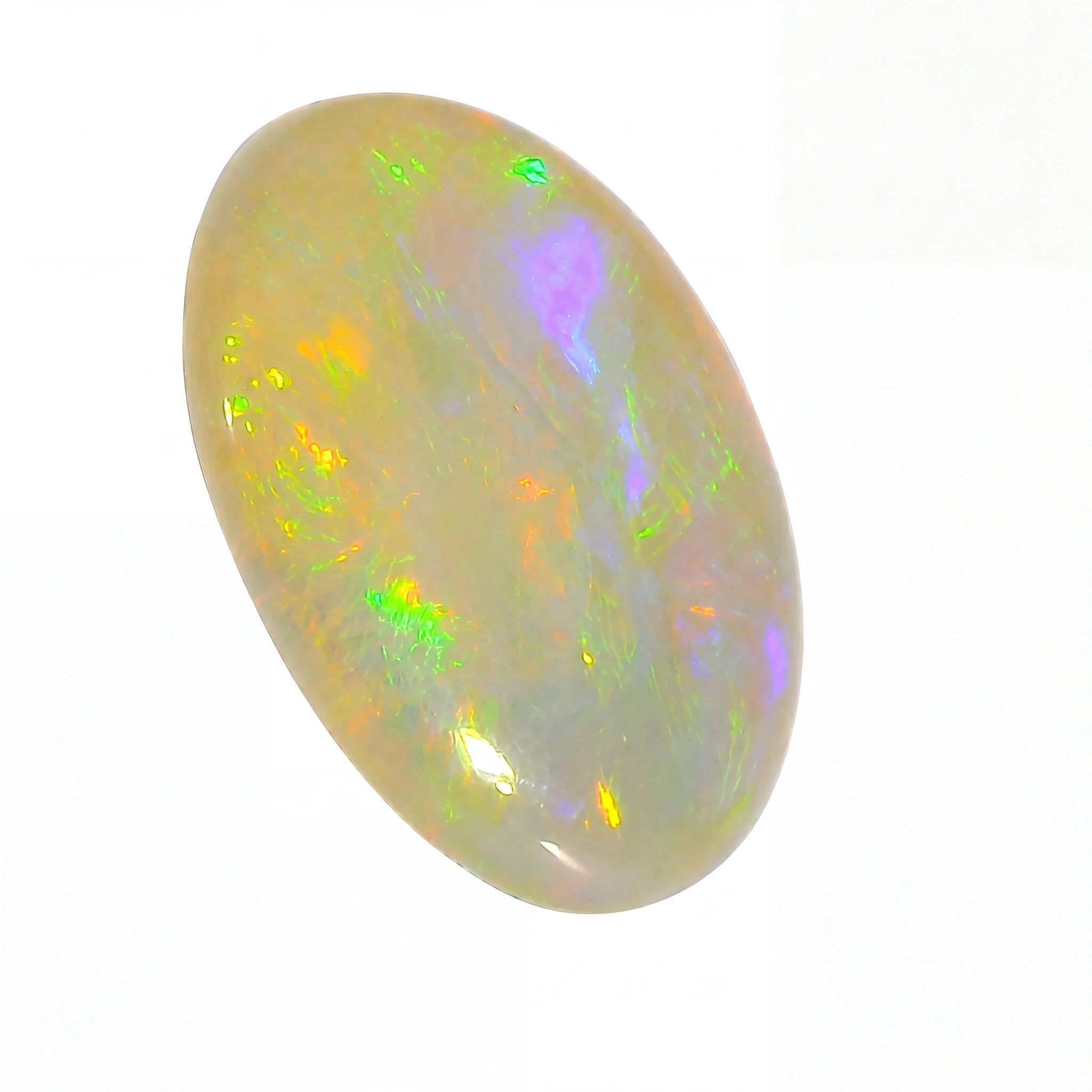 Opal stone with multicolour play of light on a white background