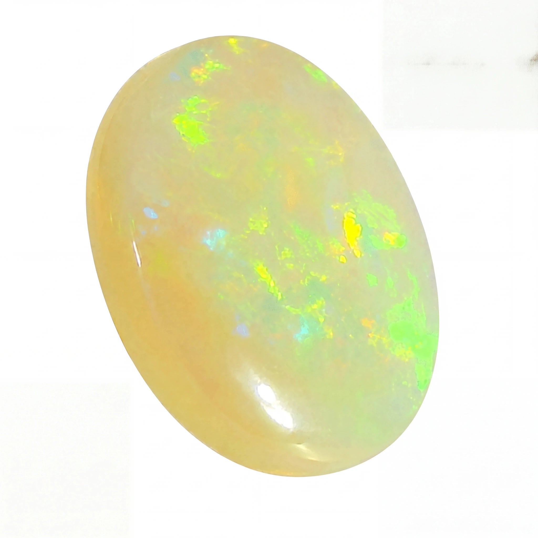 Opal stone with multicoloured fluorescence on a white background