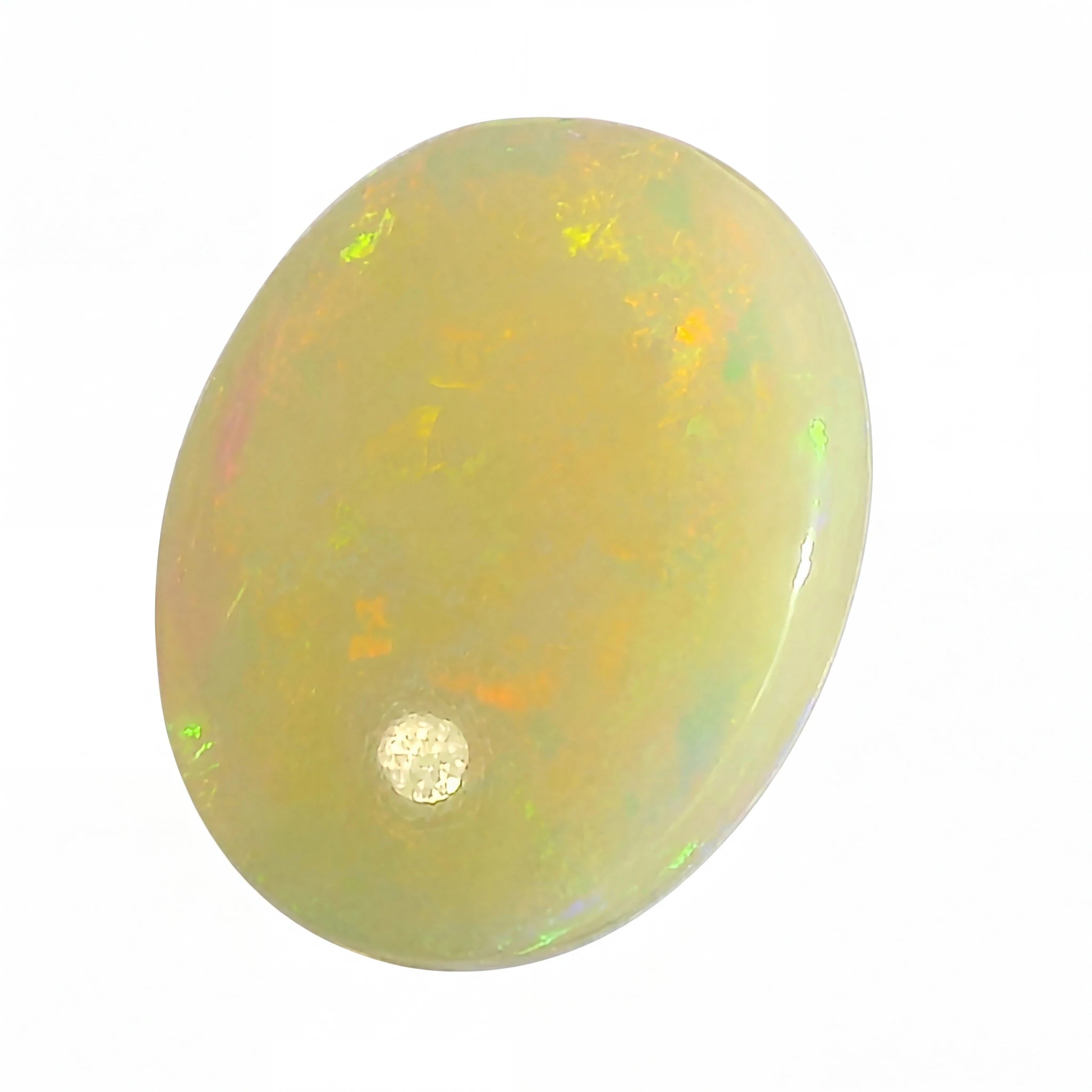 Opal gemstone with multicoloured play of light on a white background