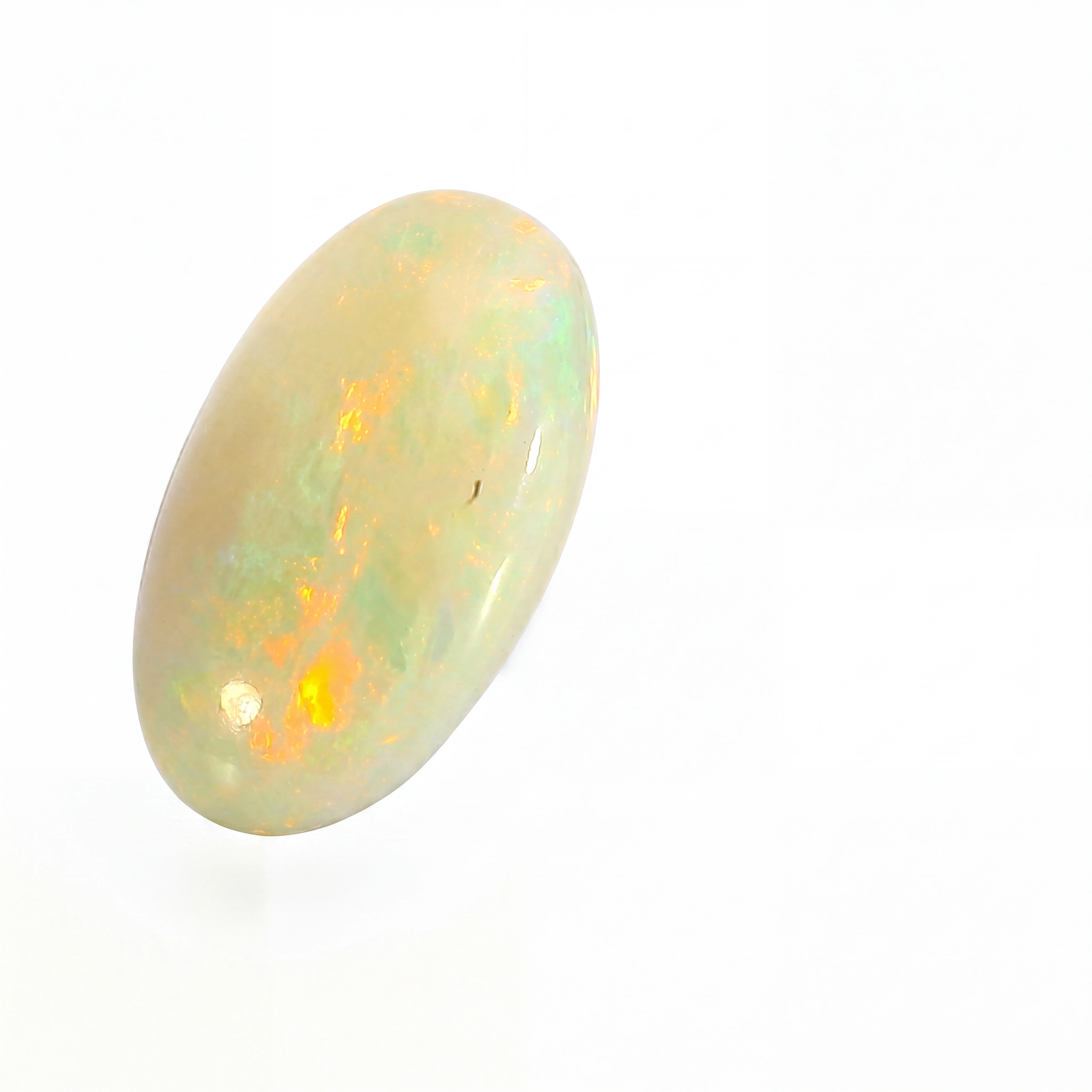 Opal stone with play of colours on a white background