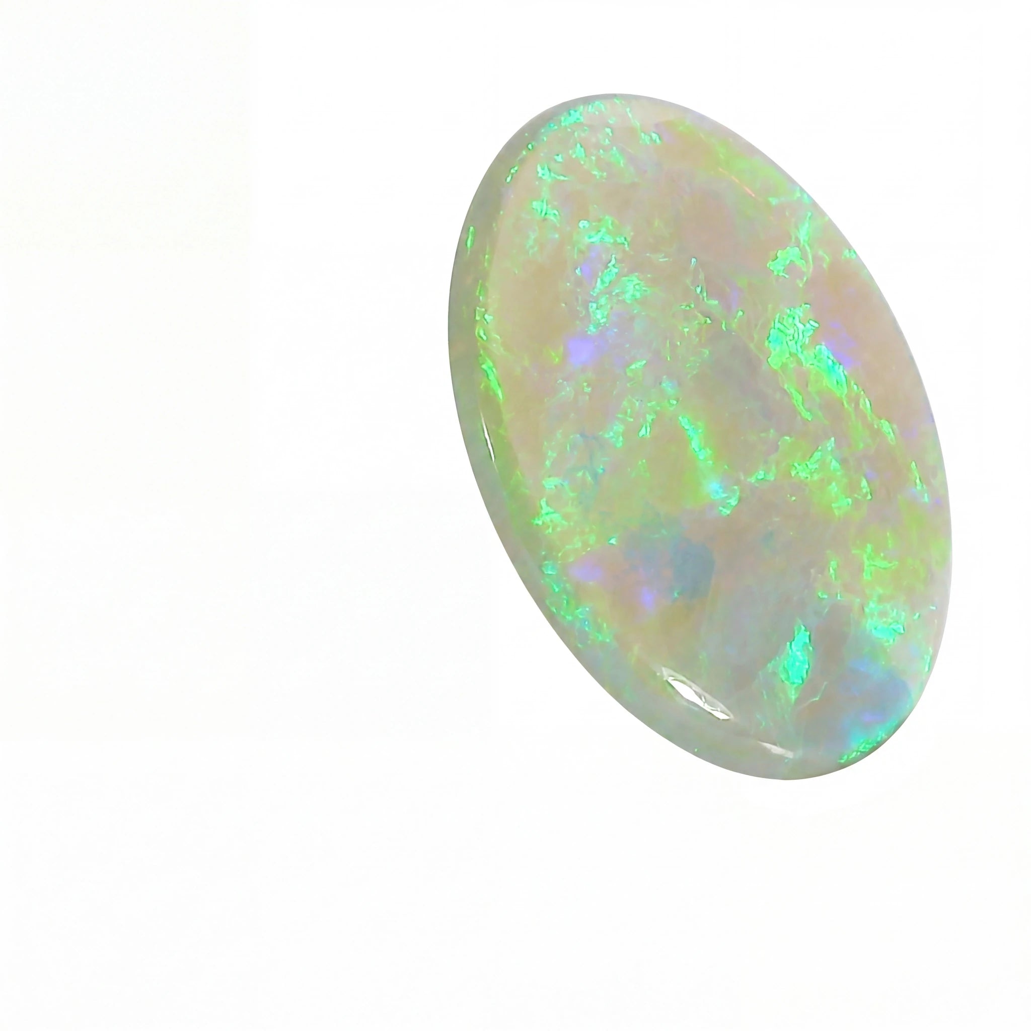 Opal stone with colourful play of light on a white background
