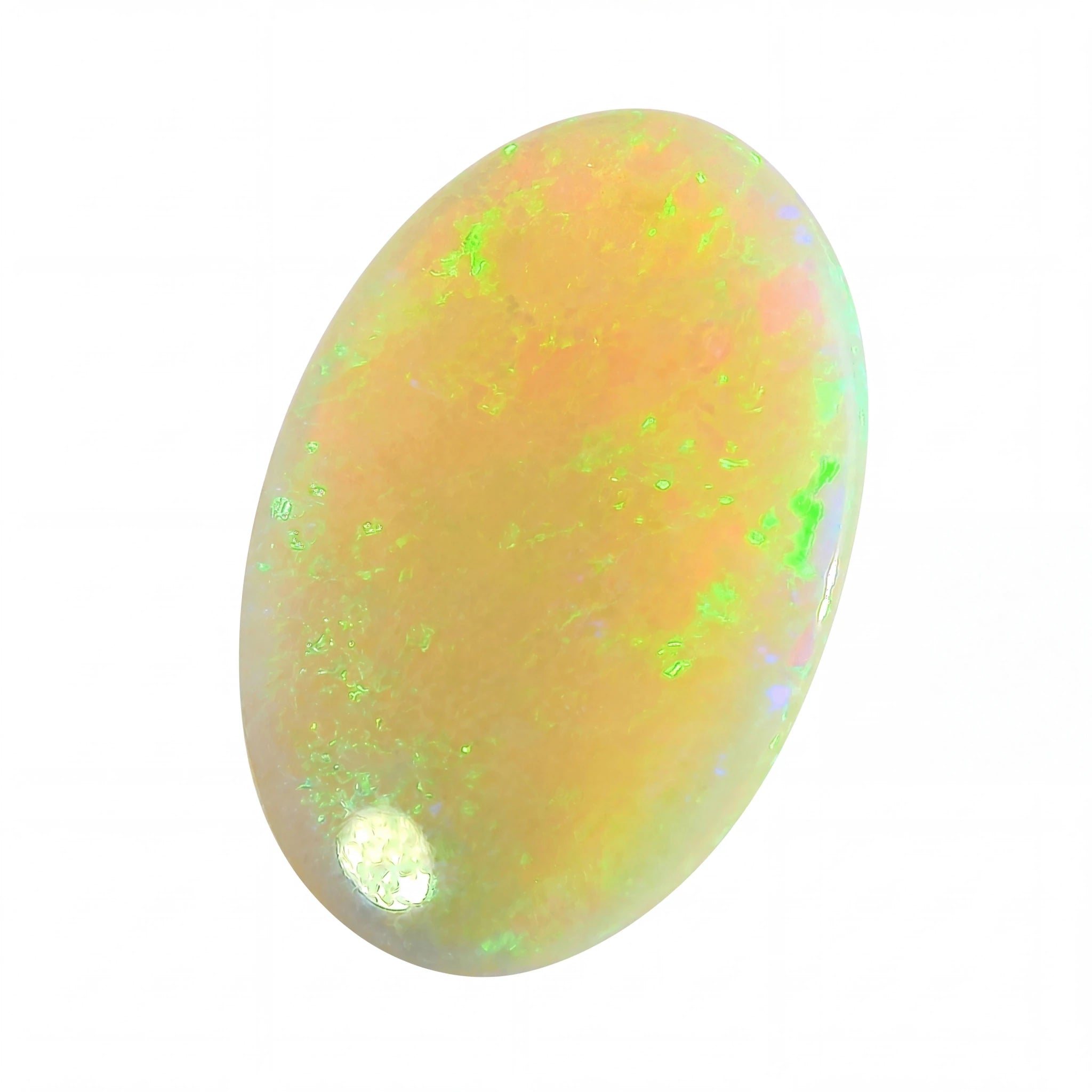 A polished oval cabochon opal gemstone displaying a play-of-colour with vibrant green, orange, and white flashes on a pale peachy base, isolated on a white background.