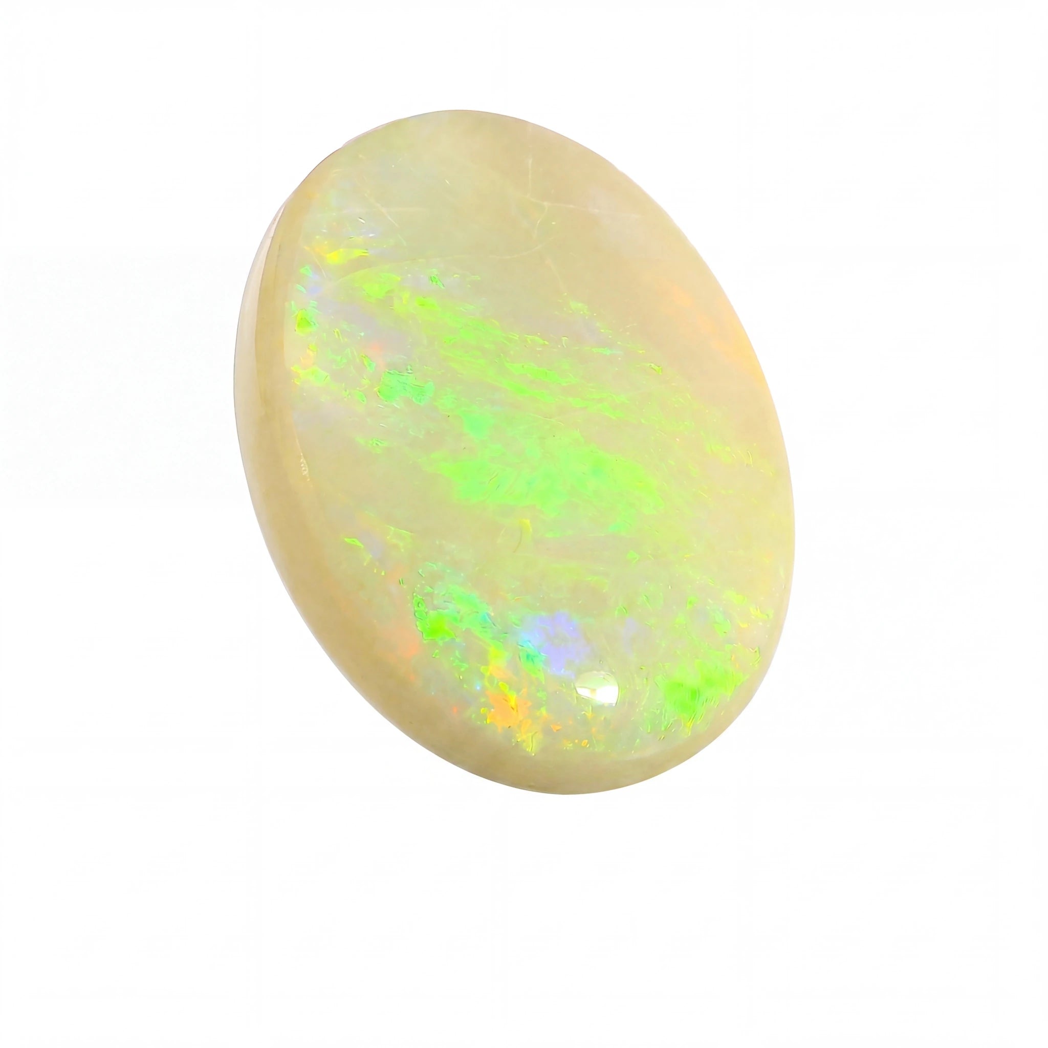 Opal stone with green and yellow fluorescence on a white background
