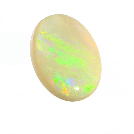 Opal stone with green and yellow fluorescence on a white background