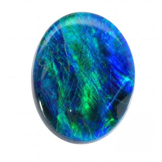 Oval-shaped opal stone with blue and green patterns on a white background