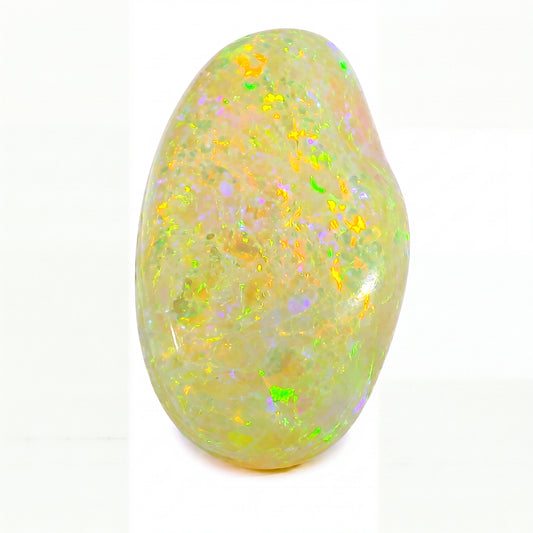 Opal stone with colourful speckles on a white background