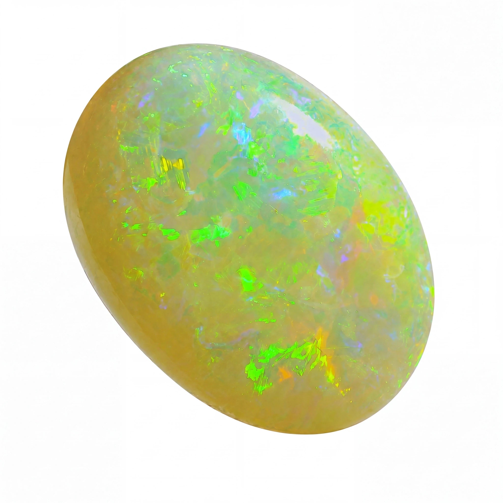 Opal stone with green and yellow fluorescence on a white background