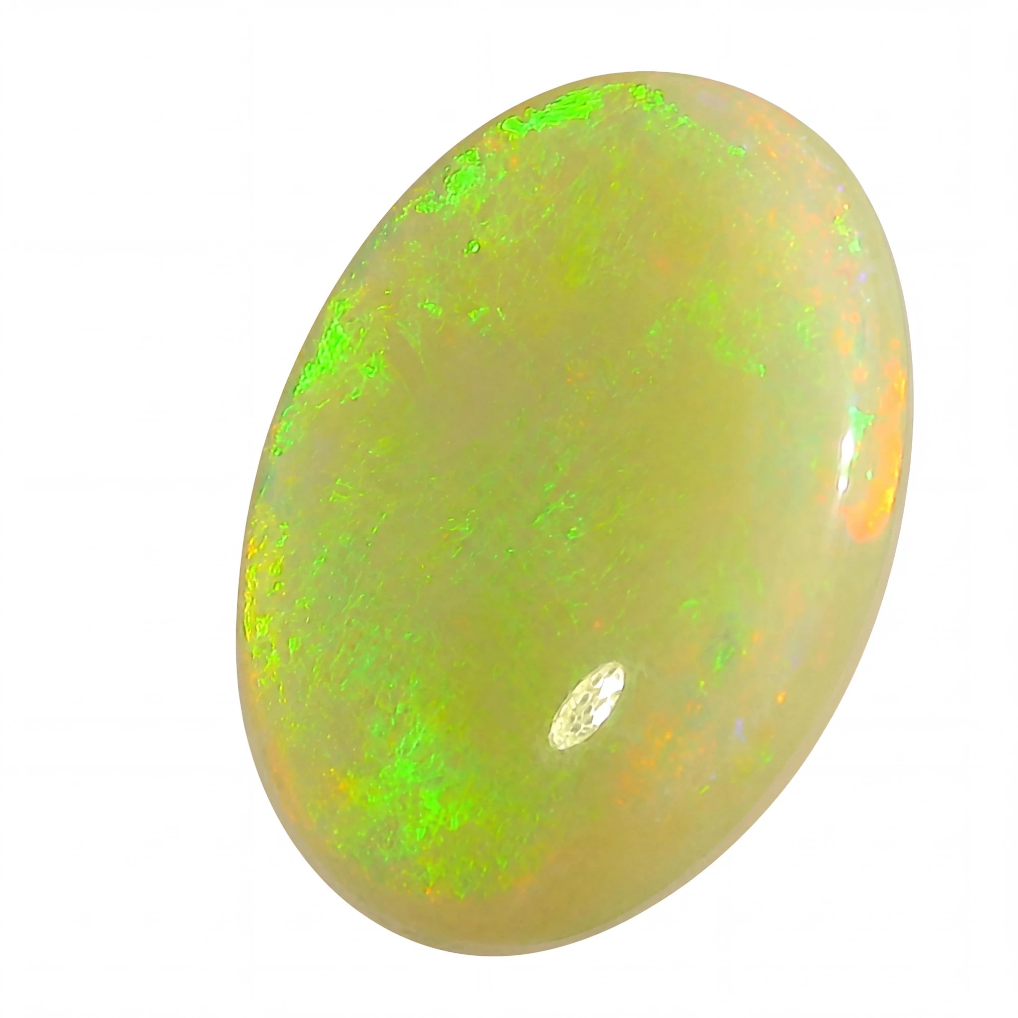 Opal stone with green fluorescence on a white background