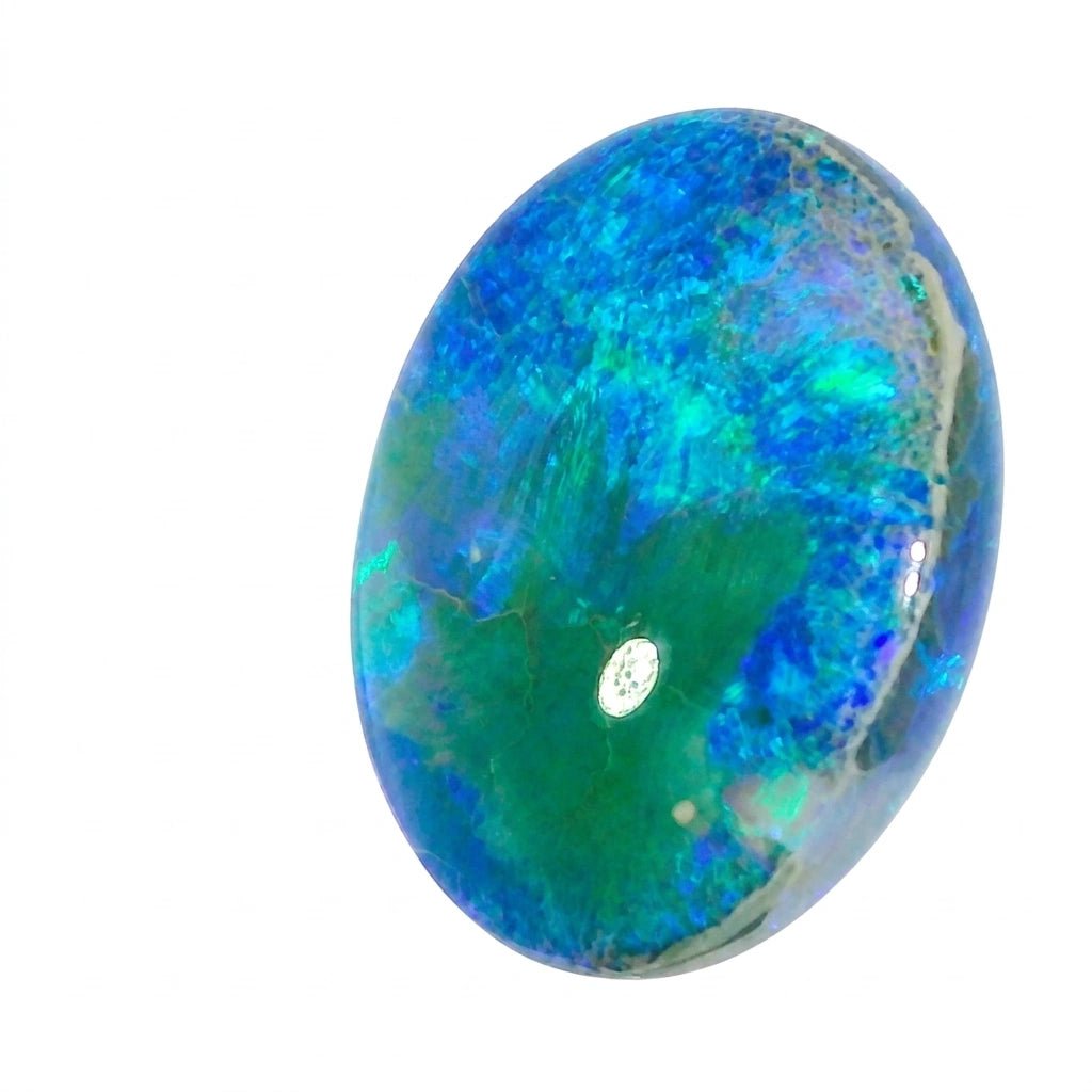 Multicoloured opal stone on a white background