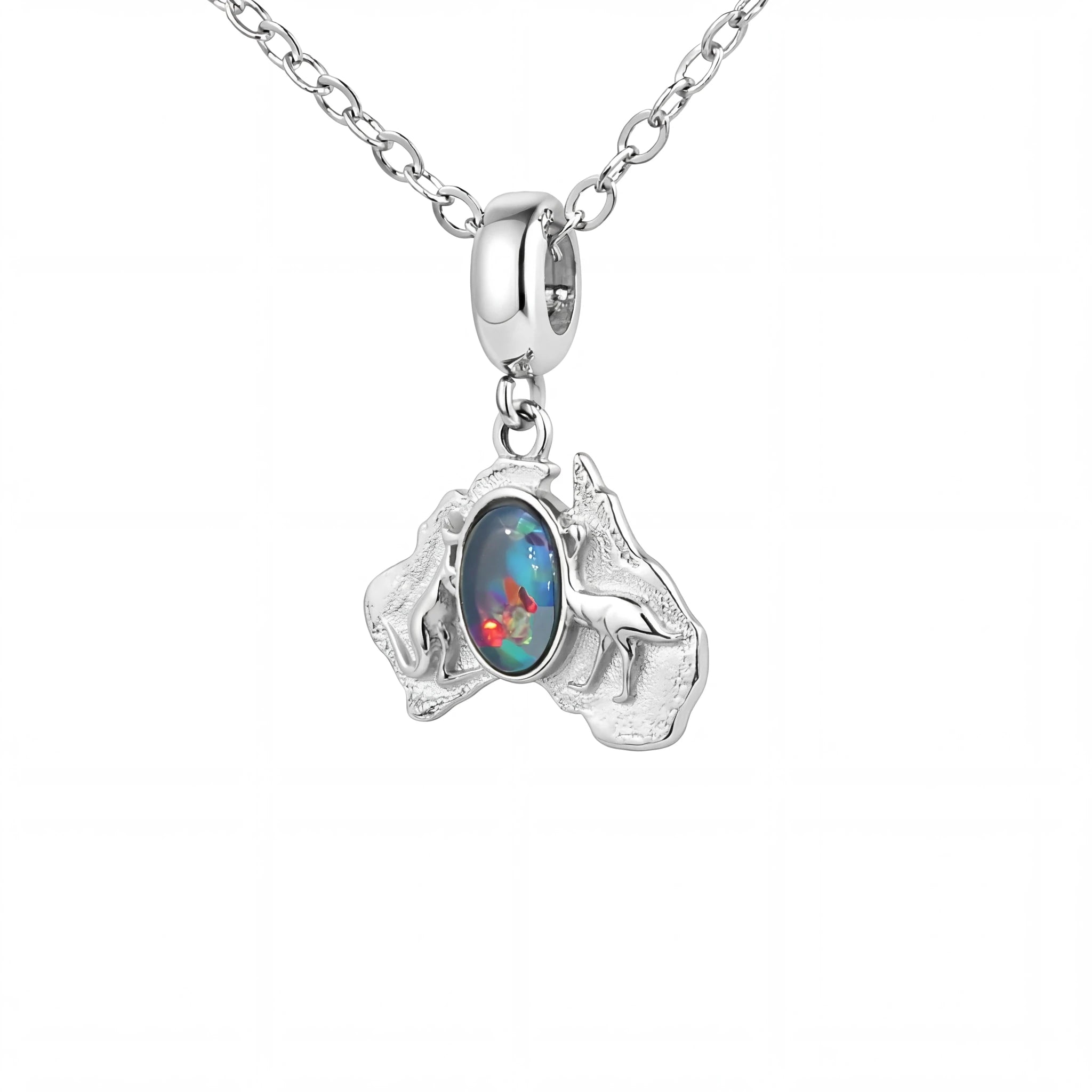 Silver pendant with a colourful gemstone on a white background