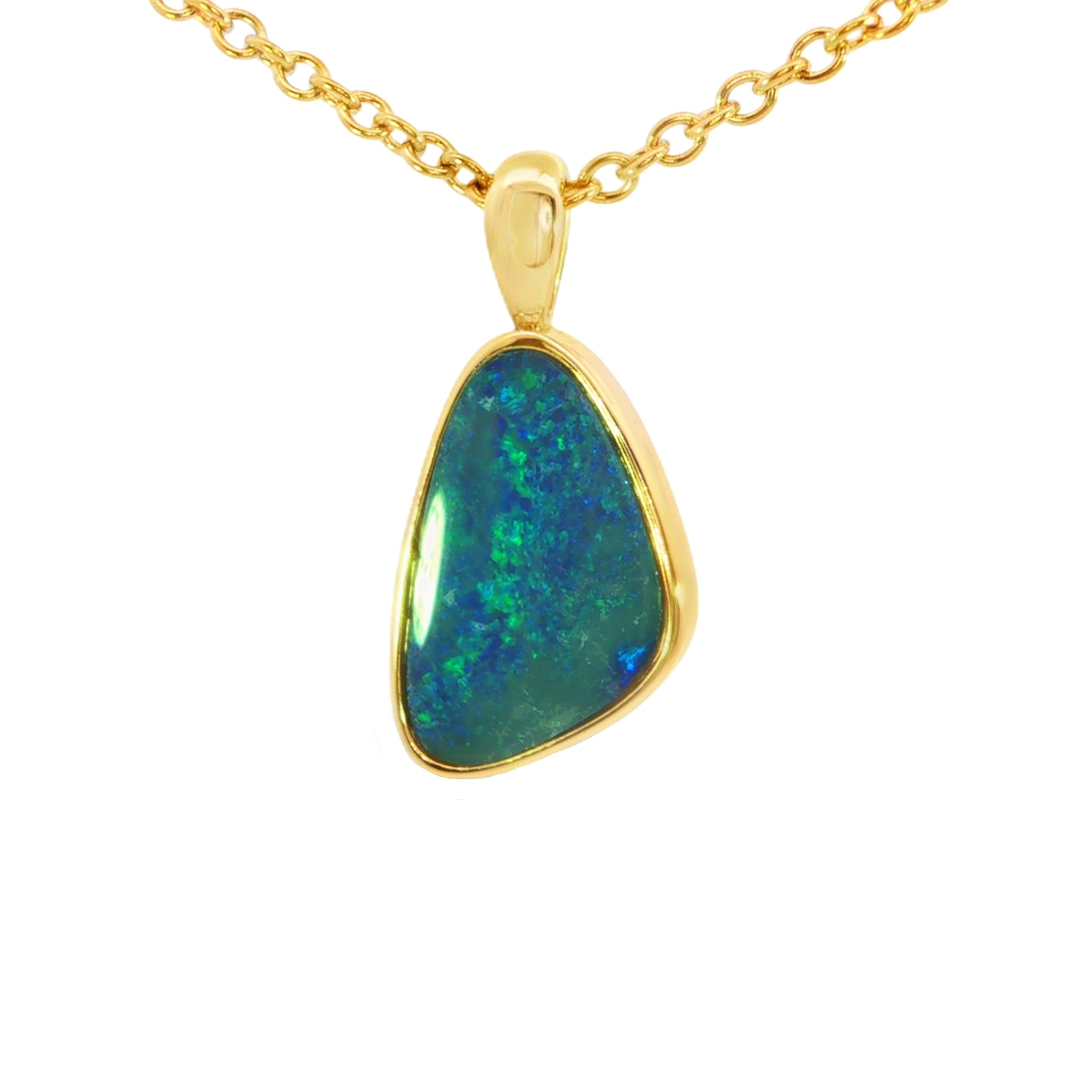 Opal pendant on a gold chain against a white background
