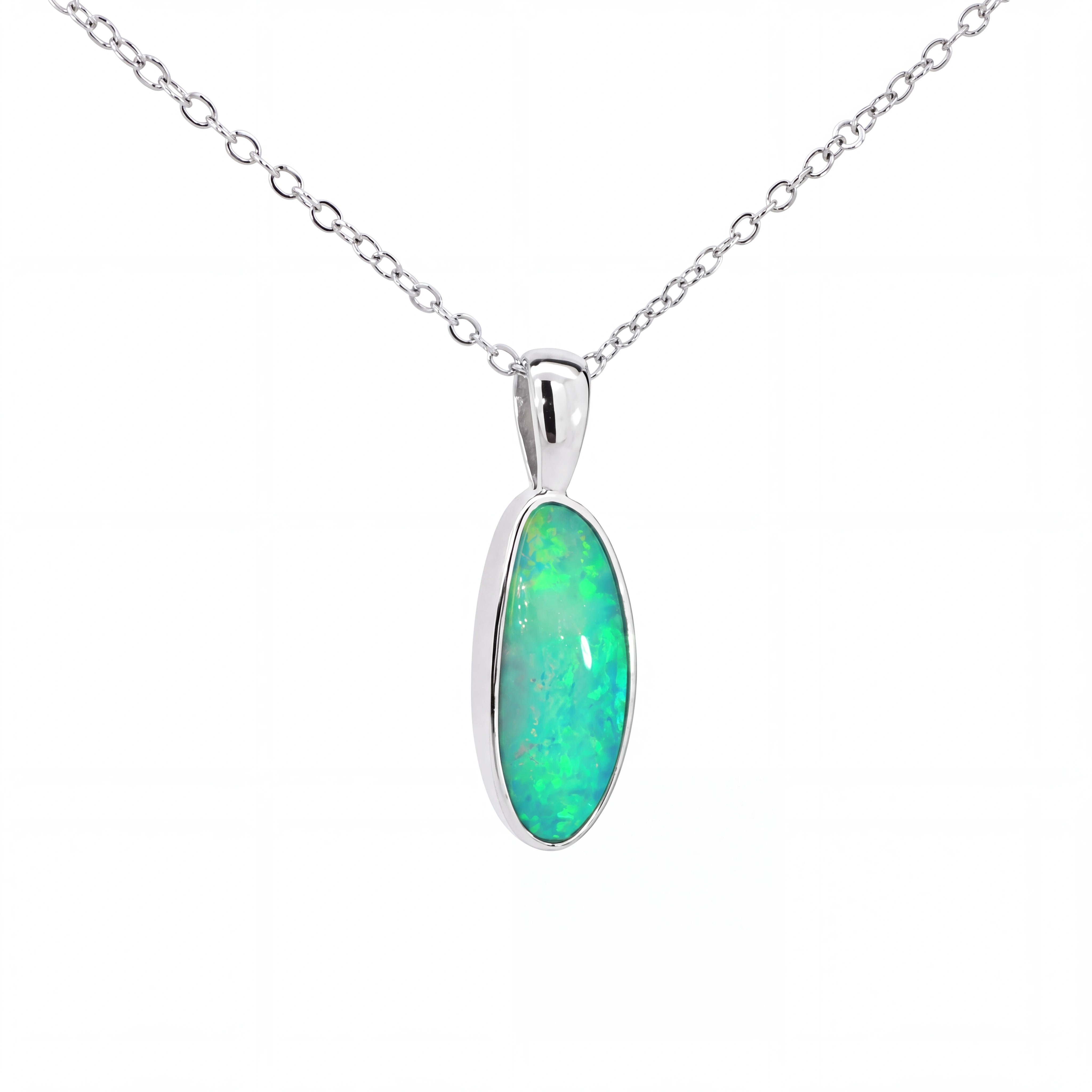 A silver chain necklace with an oval pendant featuring a vibrant green and blue opal gemstone in a polished silver bezel setting, shown against a plain white background.