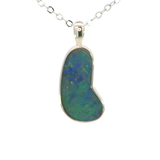 Opal pendant on a silver chain against a white background