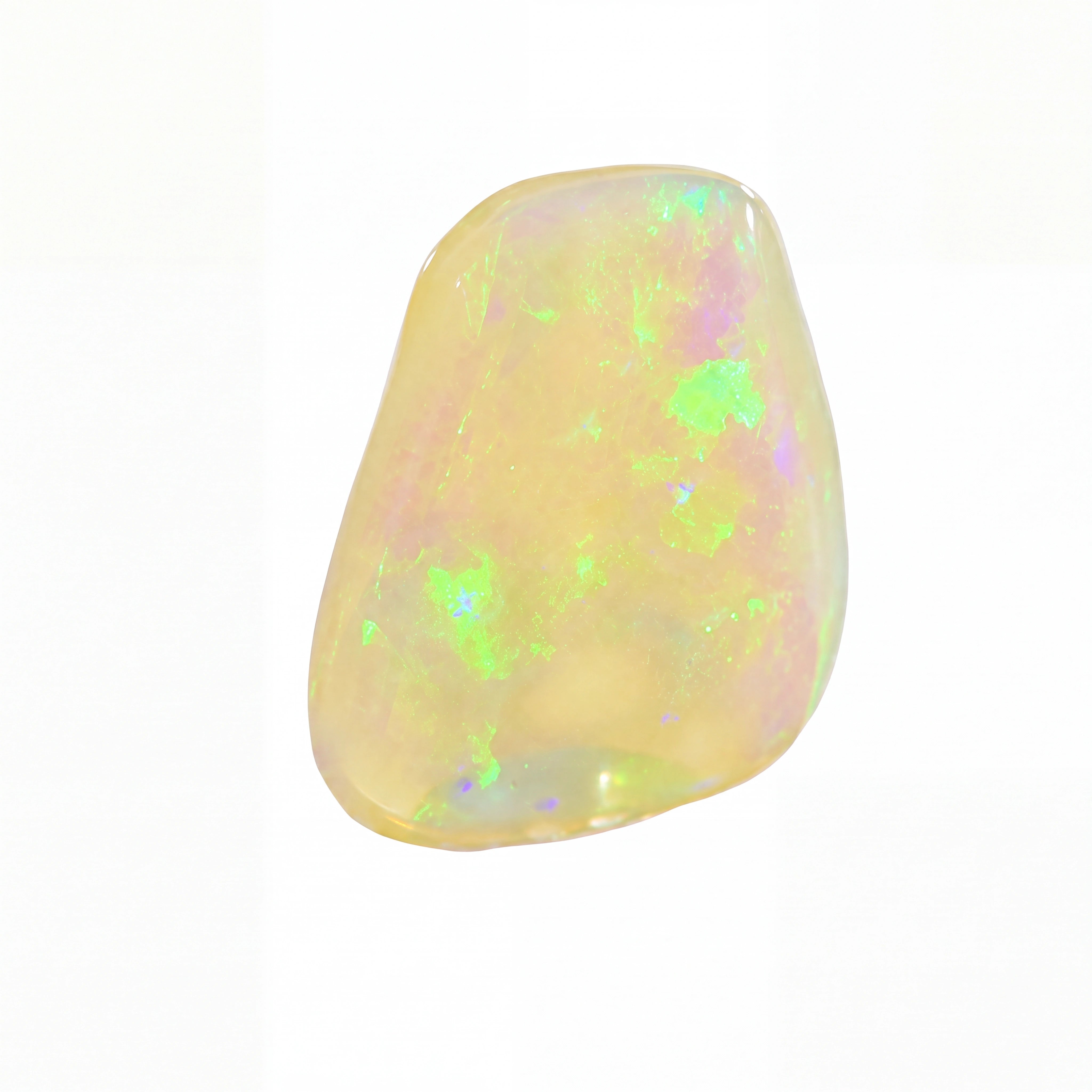 A polished, irregular-shaped white opal gemstone with vibrant green, purple, and yellow flashes, shown on a solid white background.