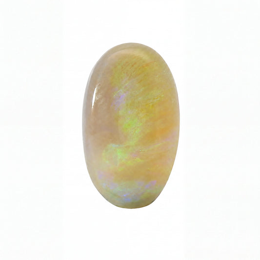 A polished oval cabochon gemstone with a pearlescent golden-beige body and iridescent flashes of green, blue, and purple, shown on a plain white background.