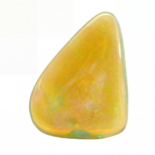 A polished, teardrop-shaped opal stone with a warm golden-yellow body and subtle green iridescent flashes, shown on a plain white background.
