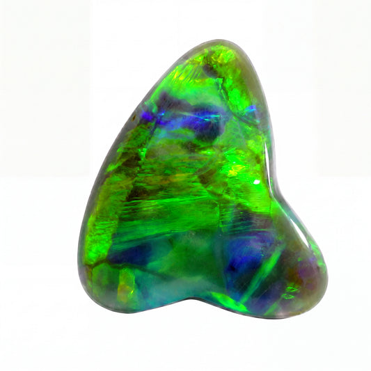 Opal stone with green and blue colours on a white background