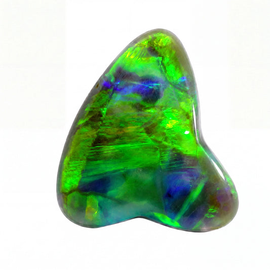 Opal stone with green and blue colours on a white background