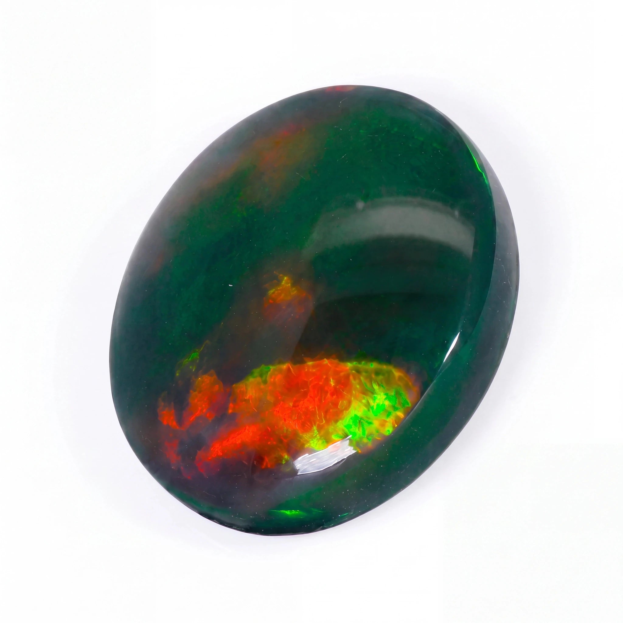 Multicoloured gemstone on a white background