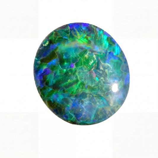 Round opal stone with green and blue colours on a white background