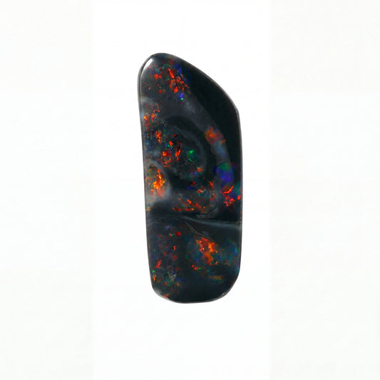 A polished black opal gemstone cabochon with vibrant iridescent flashes of orange, red, blue, and green, shown on a plain white background.