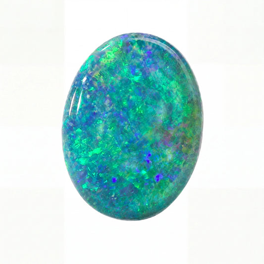 A polished oval cabochon gemstone featuring a vibrant play-of-colour pattern with green, blue, and purple flashes on a white background.