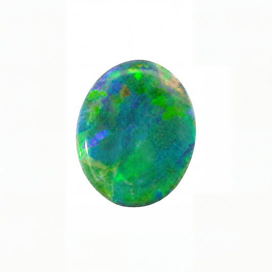 Oval-shaped opal stone with green and blue colours on a white background
