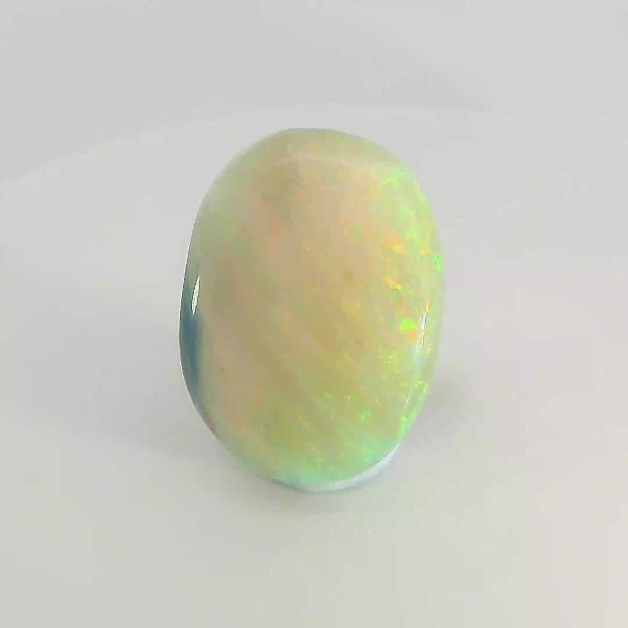 Vibrant Opal Gemstone in Hand