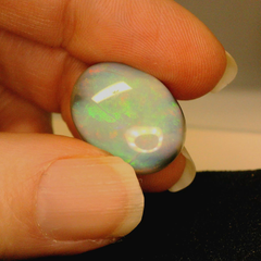 Vibrant Opal Gemstone in Hand