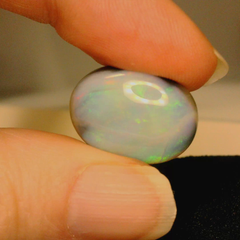 Vibrant Opal Gemstone in Hand
