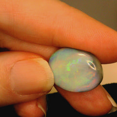 Vibrant Opal Gemstone in Hand