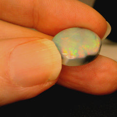 Vibrant Opal Gemstone in Hand