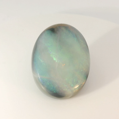Vibrant Opal Gemstone in Hand