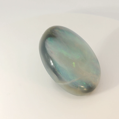 Vibrant Opal Gemstone in Hand