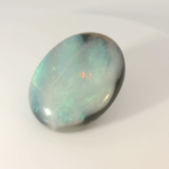 Vibrant Opal Gemstone in Hand