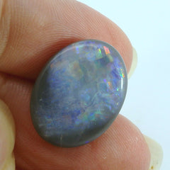Captivating Opal Gemstone in Hand