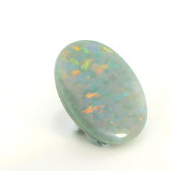 Vibrant Opal Gemstone in Hand