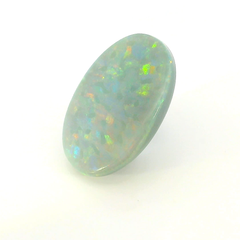 Vibrant Opal Gemstone in Hand