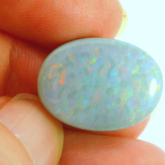 Vibrant Opal Gemstone in Hand