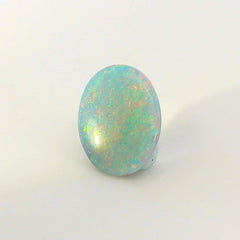 Vibrant Opal Gemstone in Hand