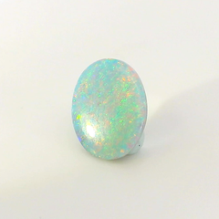 Vibrant Opal Gemstone in Hand