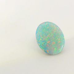 Vibrant Opal Gemstone in Hand