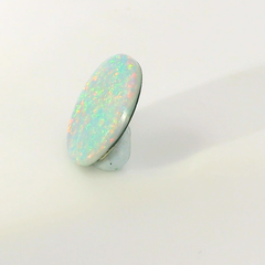 Vibrant Opal Gemstone in Hand