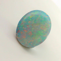 Vibrant Opal Gemstone in Hand