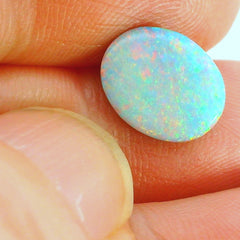 Vibrant Opal Gemstone in Hand
